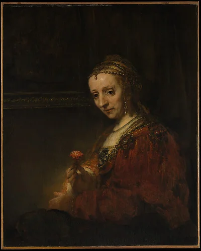 Woman with a Pink by Rembrandt (Rembrandt van Rijn)